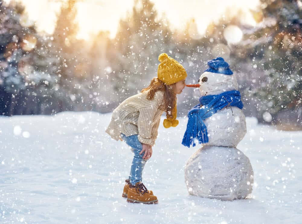 Jahreskreis Winter - Kind mit Schneemann