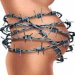 Geburtsschmerzen - Schwangerenbauch mit Stacheldraht umwickelt